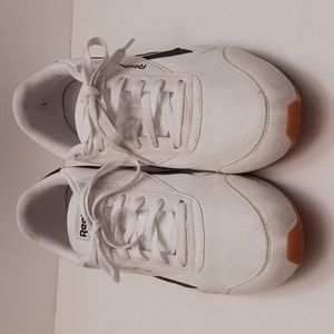 Reebok size 10 1/2 women's sneakers in white and black.